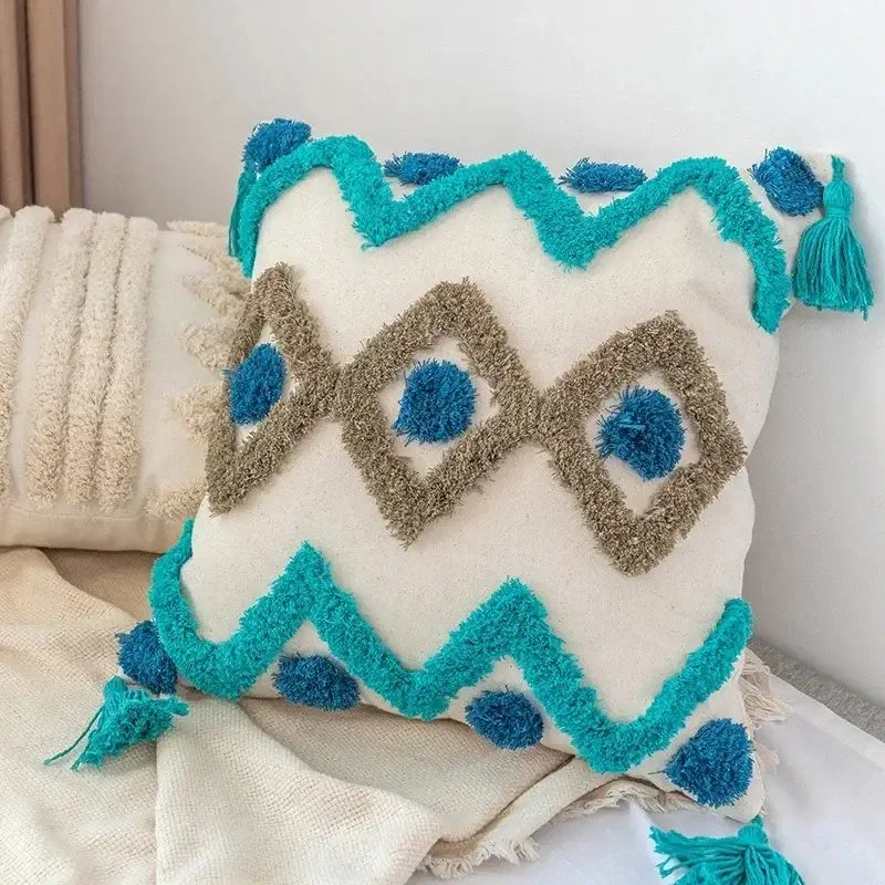 Cream-colored bohemian tufted cushion cover with turquoise beige geometric patterns and fluffy tassels for living room decorbites bohemian tufted tassel pillow
