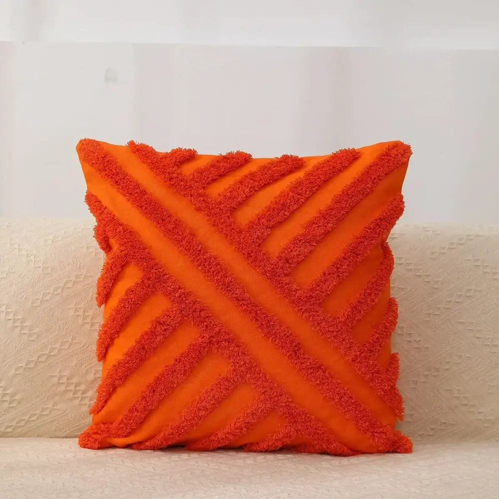 Vibrant orange throw pillow with textured fringed diagonal stripes bohemian tufted tassel cushion cover decorbites