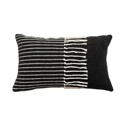 Bohemian beige and brown tufted cushion cover with black and white woven knit texture and bohemian tufted tassel edges