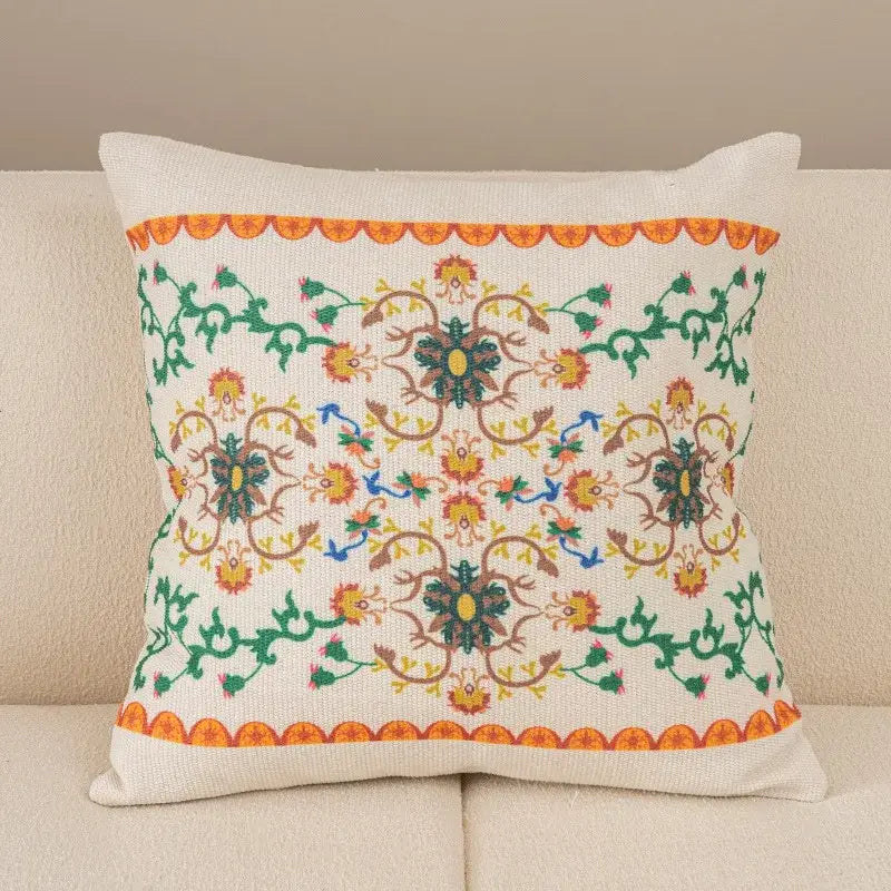 Bohemian beige and brown tufted cushion cover with embroidered floral and vine decorbites bohemian tufted design