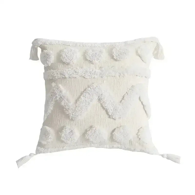 Cream-colored textured throw pillow with fluffy pom-poms and tassels bohemian tufted tassel cushion cover decorbites bohemian tufted