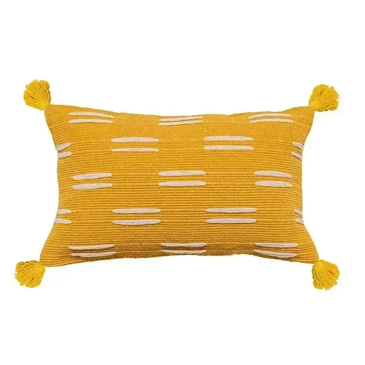 Vibrant yellow rectangular cushion cover with white stripes and bohemian tufted tassel accents for living room decorbites decor