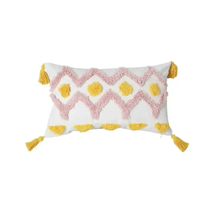 White rectangular cushion cover with pink and yellow bohemian tufted tassel decorbites bohemian tufted design