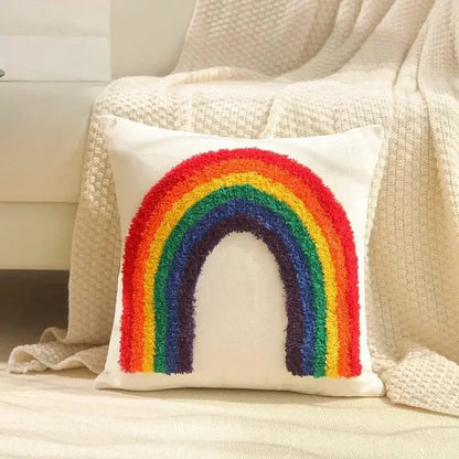 Cozy white cushion cover with vibrant textured rainbow design in classic hues for decorbites bohemian tufted decor