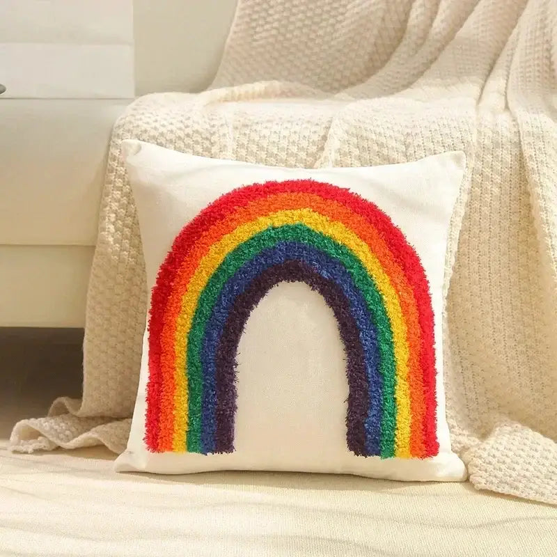 Cozy white cushion cover with vibrant textured rainbow design in classic hues for decorbites bohemian tufted decor