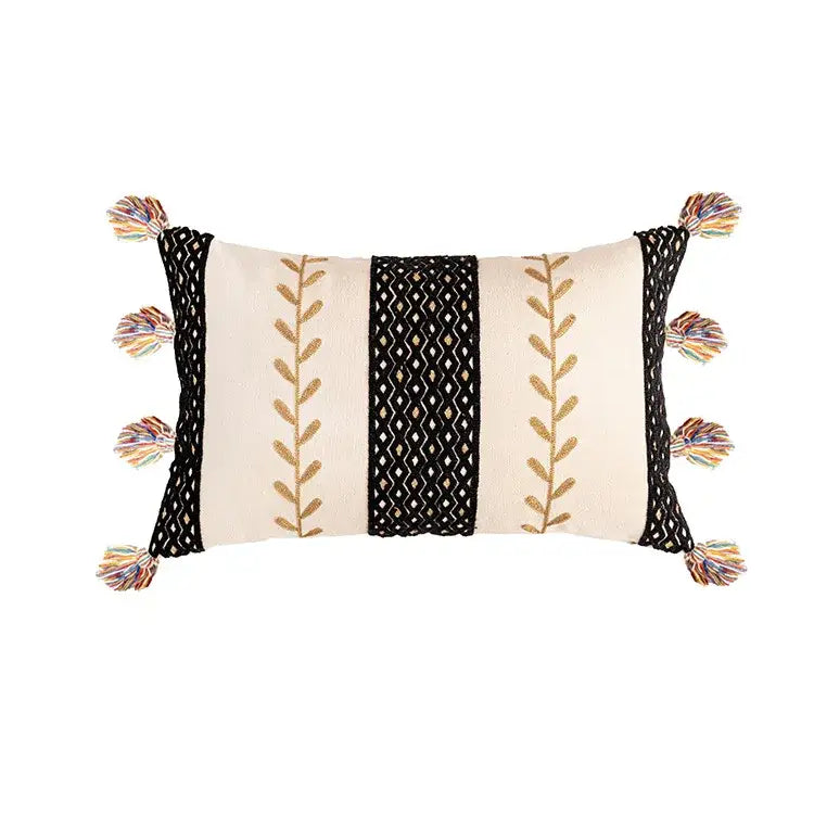 Cream-colored cotton cushion cover with black and gold embroidery and colorful tassels by decorbites bohemian cotton