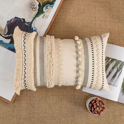 Beige and gray striped bohemian beige cushion cover with fringed edges tassels and pom-pom accents for living room decor