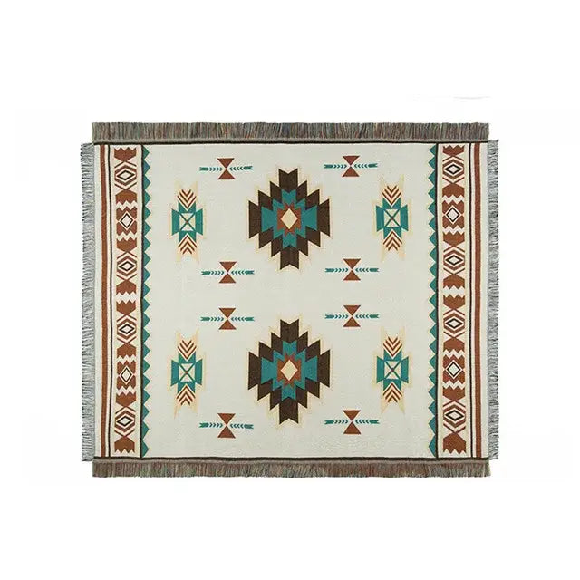 Beige woven bohemian sofa blanket with teal brown geometric tribal patterns and fringed edges vintage plaid design decorbites