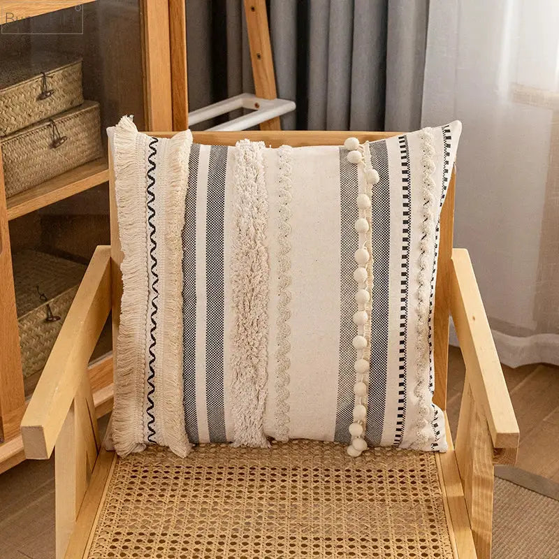 Bohemian beige striped cushion cover with tassels featuring cream and gray vertical stripes for home decor