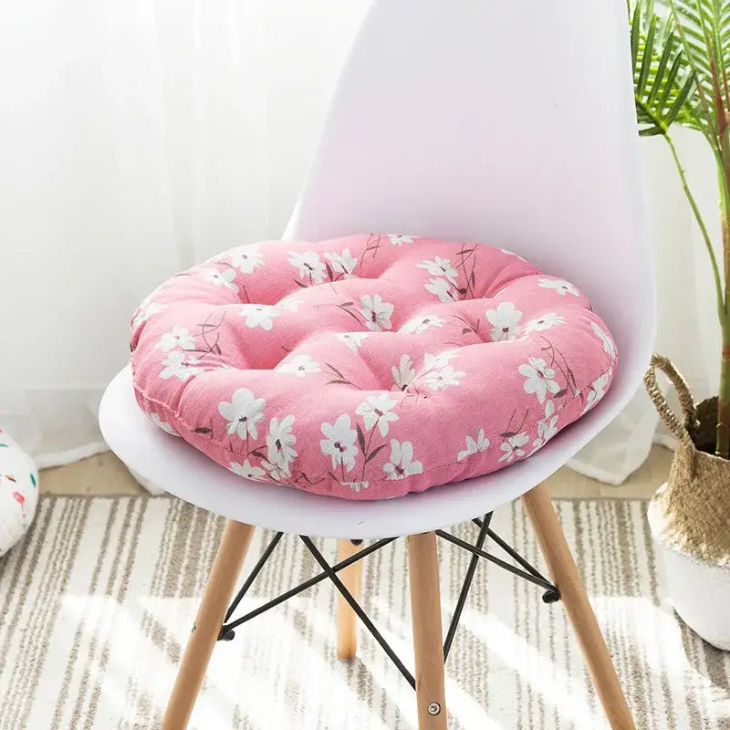 Pink floral cushion pouf with tufted design and soft fabric in bohemian blue green and red geometric meditation cushion pouf