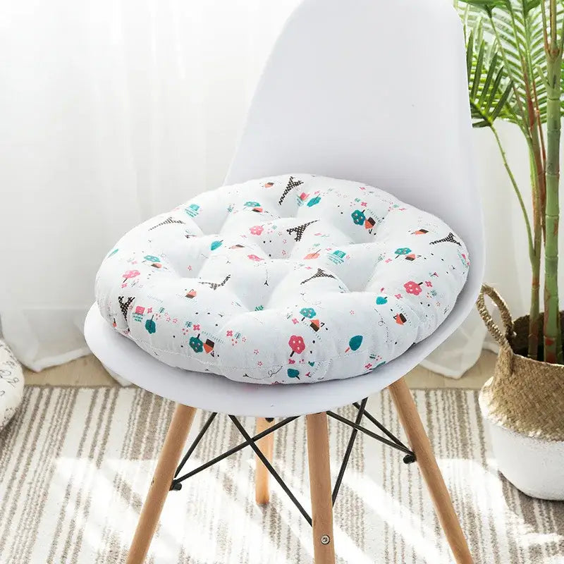 White tufted cushion pouf with playful parisian pattern in soft pastels for bohemian meditation cushion pouf use