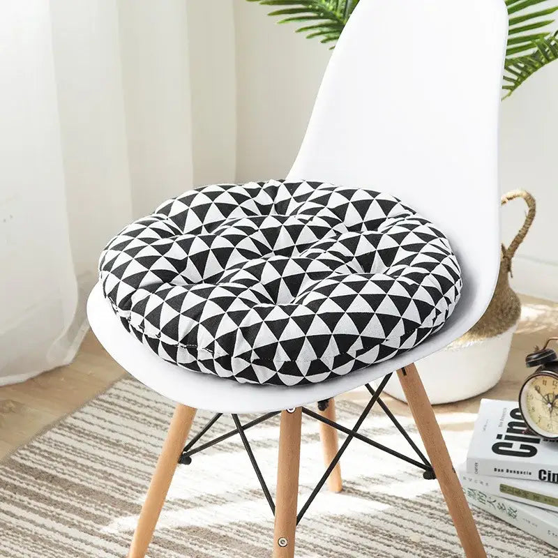 Black and white geometric triangle-patterned round meditation cushion pouf for bohemian living room decor