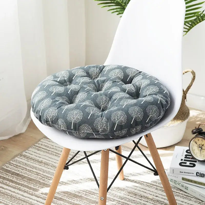Bohemian gray meditation cushion pouf with white tree patterns upholstered in soft fabric for living room use