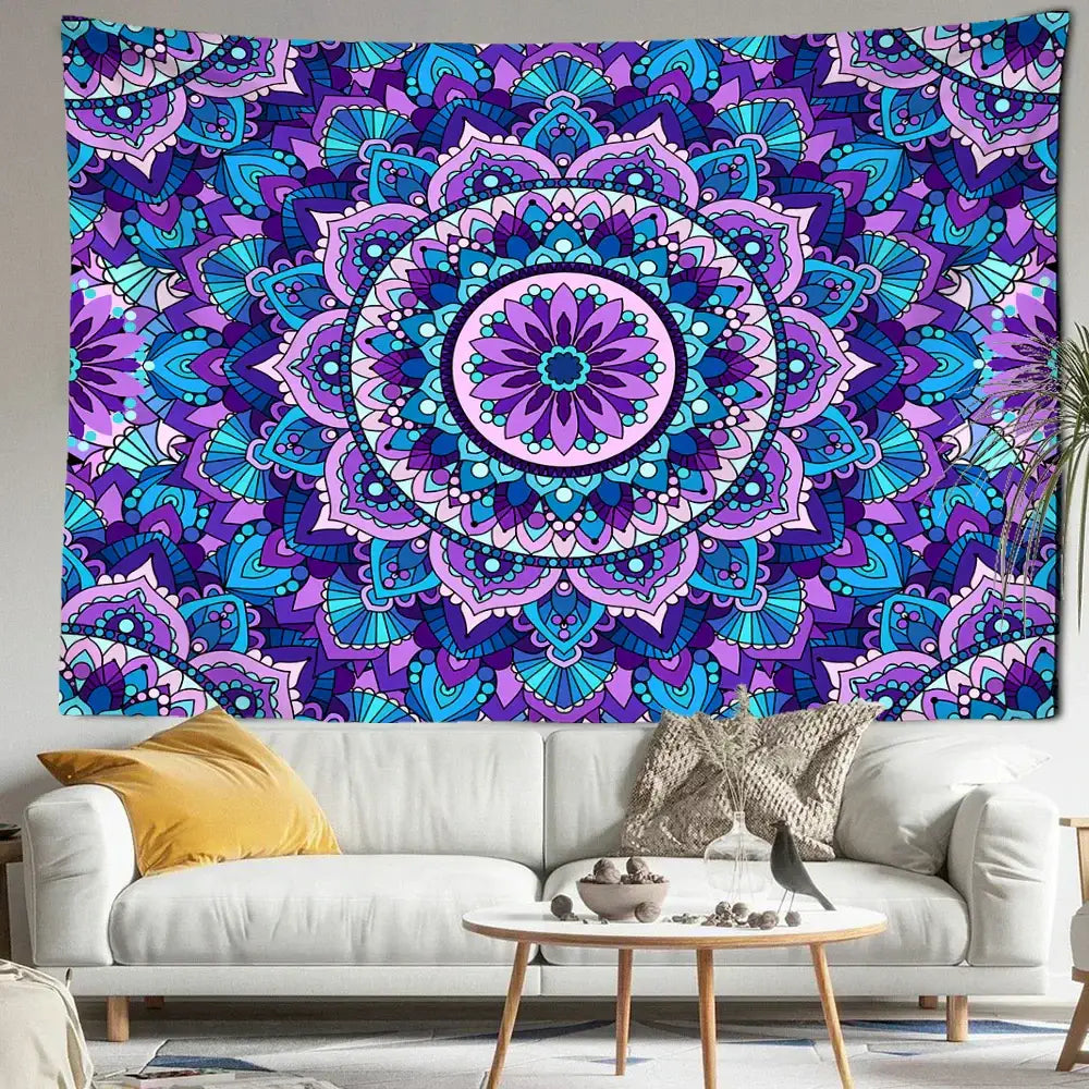 Bohemian blue purple mandala tapestry with intricate floral patterns hanging above a white sofa wall hanging
