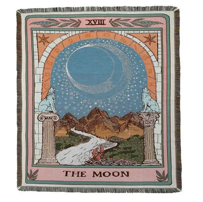 Woven bohemian camping blanket by decorbites featuring the moon tarot card with blue crescent moon and wolves design