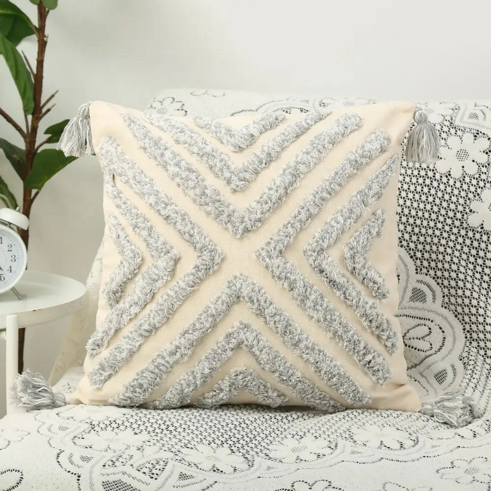 Cream-colored bohemian chenille pillowcase with textured gray geometric patterns and tassels for living room decorbites bohemian
