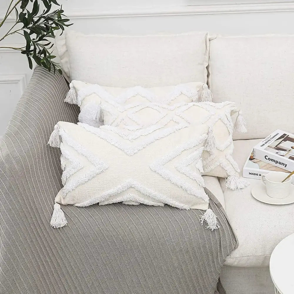 Cream-colored bohemian chenille pillowcase with textured geometric patterns and white tassels for living room decorbites bohemian