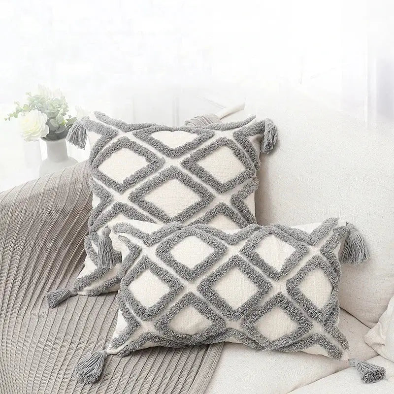 Cream-colored decorbites bohemian chenille pillowcase with gray geometric pattern and tassels for living room decor