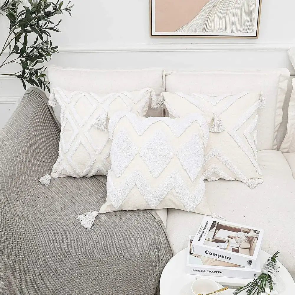 Cream-colored bohemian chenille pillowcase with textured diamond chevron patterns and soft white tassels for living room decorbites bohemian