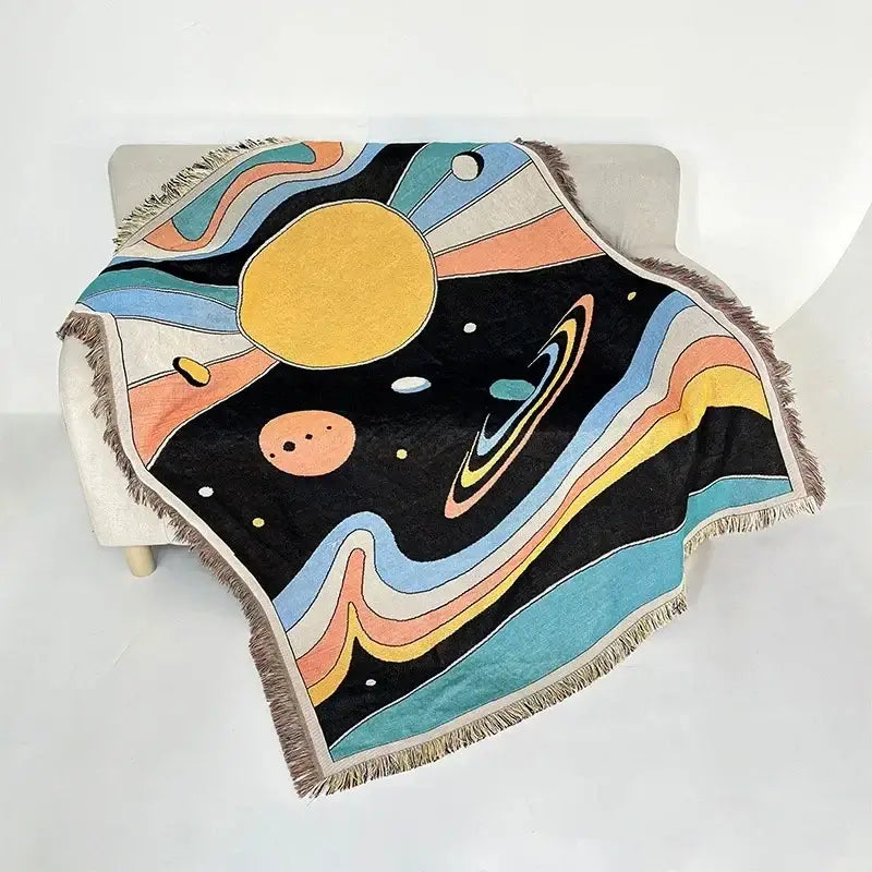 Bohemian classic design cozy woven throw blanket with vibrant cosmic sun and pastel planets decorbites bohemian classic