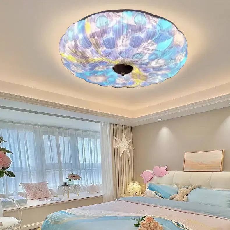 Bohemian colorful mandala led ceiling light with translucent iridescent glass shade in blue purple and yellow swirl patterns