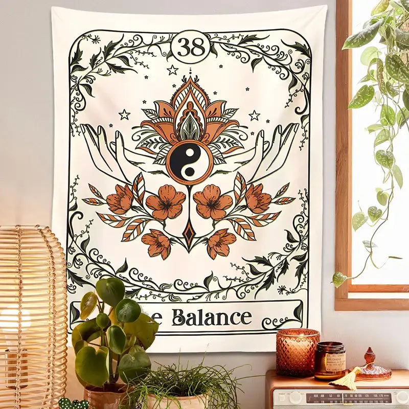 A cream balance tarot tapestry wall hanging featuring orange flowers black vines and a central yin yang symbol for decor