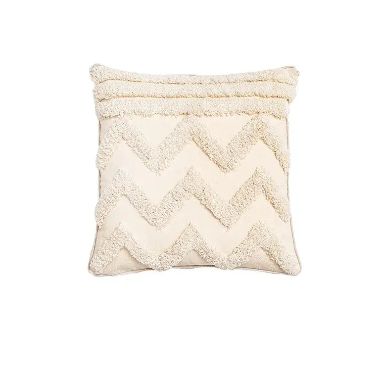 Cream-colored square cushion cover with textured fluffy zigzag pattern and fringe trim for living room decor by decorbites bohemian tassel