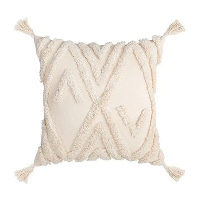 Cream-colored textured cushion covers with fringe geometric patterns and tassels for decorbites bohemian tassel living room decor