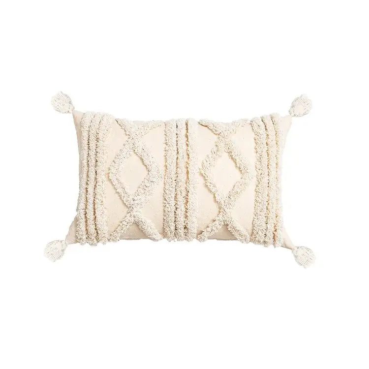 Cream-colored cushion covers with woven diamond patterns and tassels for decorbites bohemian tassel living room decor