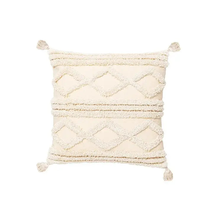 Cream-colored cushion cover with textured diamond stripe patterns and fluffy tassels for living room decor by decorbites bohemian tassel