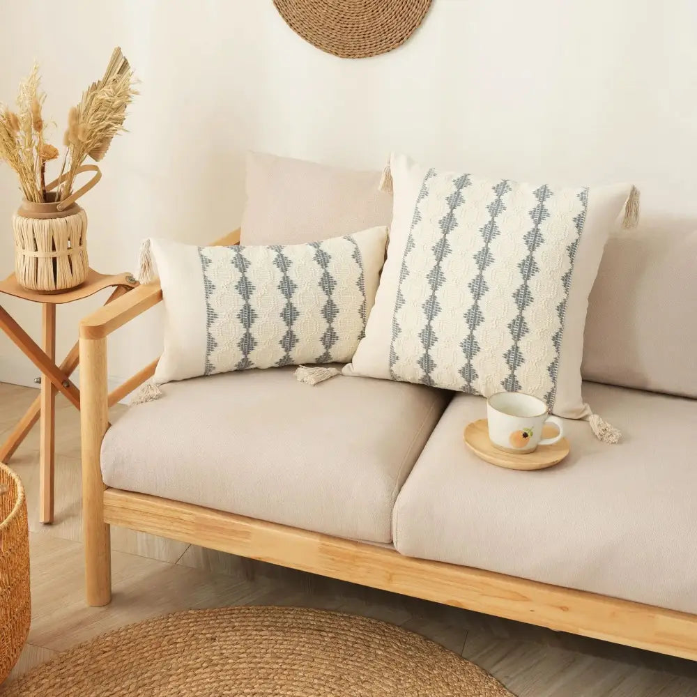 Beige cushion cover with gray geometric pattern and tassels from decorbites bohemian tassel collection for living room decor