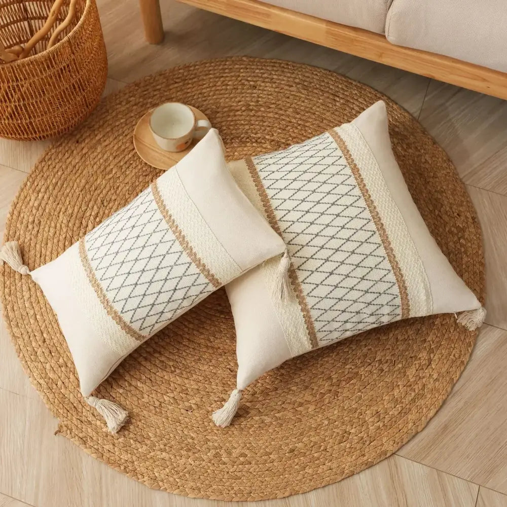 Cream-colored rectangular cushion cover with beige gray geometric patterns and tassels decorbites bohemian tassel cushion