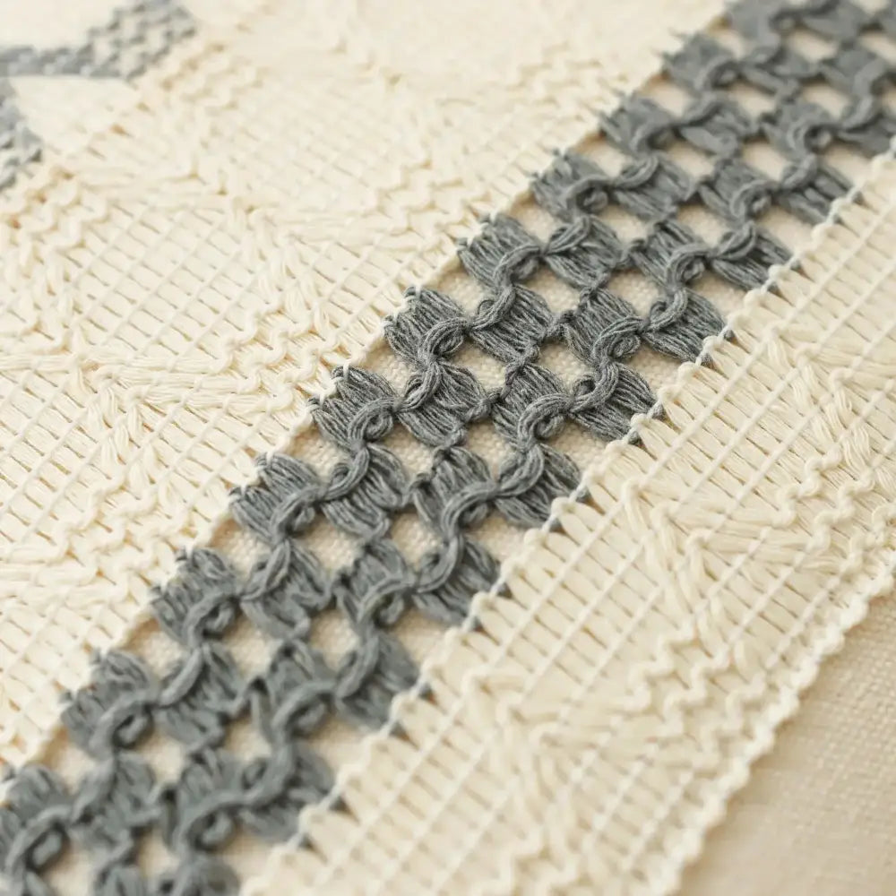 Gray crocheted lace trim with textured interlocking pattern on decorbites bohemian tassel cushion cover for living room decor