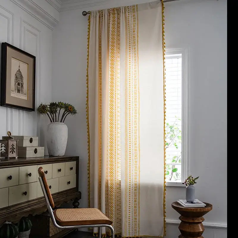 Cream-colored decorbites bohemian ethnic curtains with gold geometric patterns and tassels for living room decor