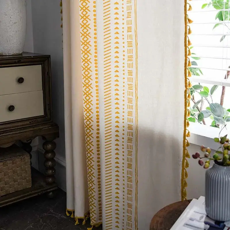 Cream-colored decorbites bohemian ethnic curtain with intricate yellow geometric tassels for living room decor
