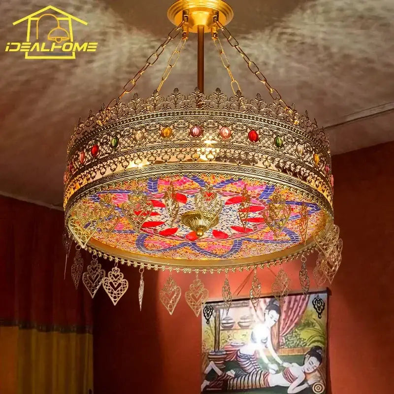 Gold-toned ornate bohemian exotic stained glass pendant lights with colorful mosaic panels and heart charms for dining room decorbites