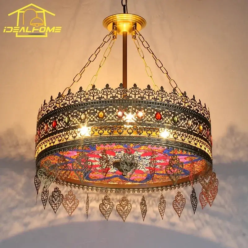 Ornate brass pendant lights with intricate filigree colorful stained glass and heart-shaped metal ornaments decorbites bohemian exotic