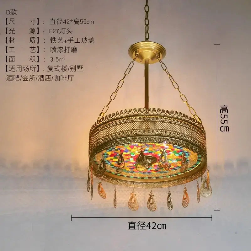 Golden ornate pendant lights with intricate peacock mosaic glass panels and teardrop pendants decorbites bohemian exotic