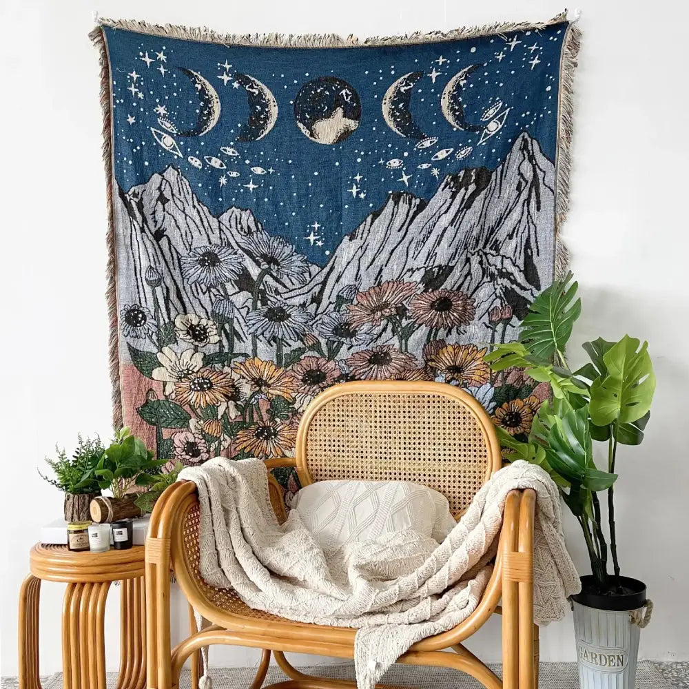 Navy blue woven throw blanket with celestial moon phases stars and floral mountains bohemian decorbites bohemian throw