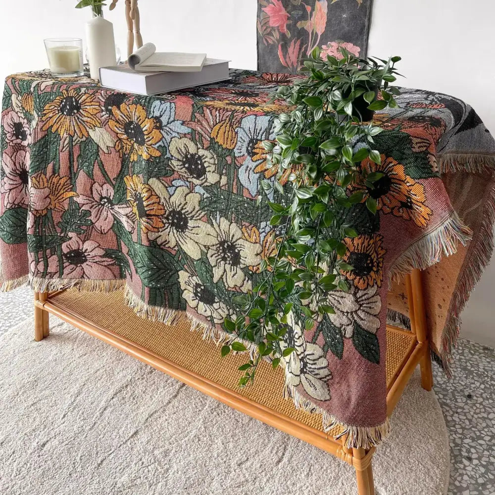 Bohemian throw blanket with vibrant pink orange cream floral pattern woven fabric and fringed edges for decorbites decor
