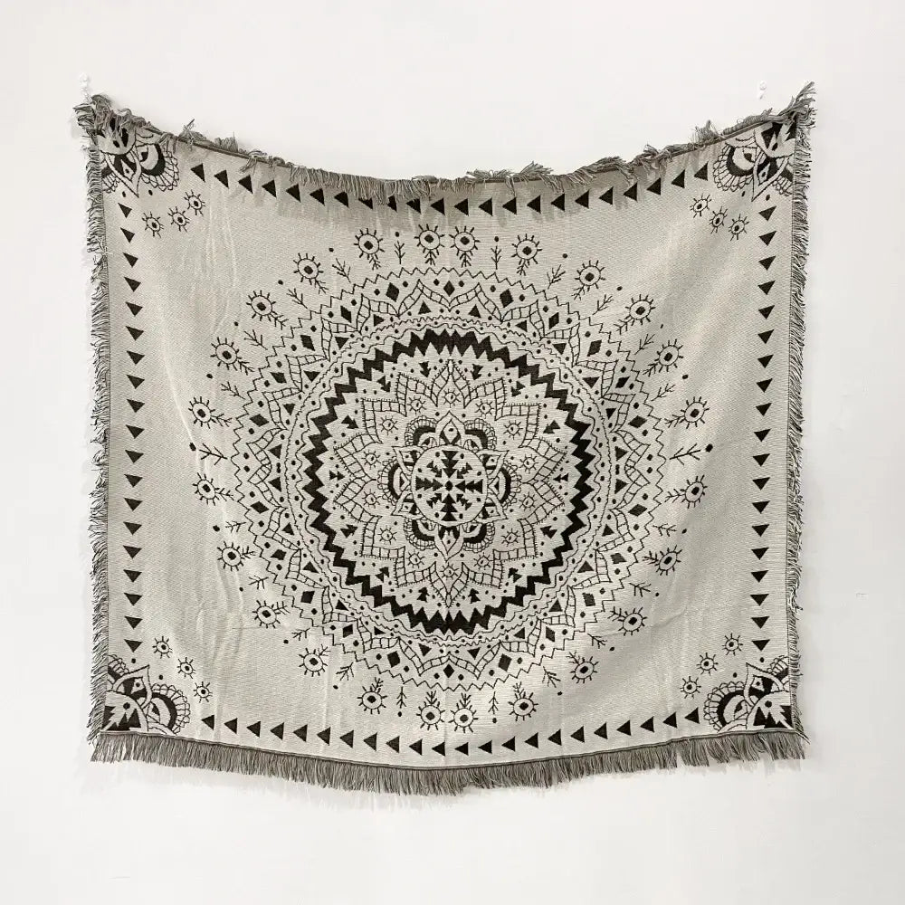 Bohemian throw blanket with black and off-white woven mandala design and fringe for living room decorbites throw blanket