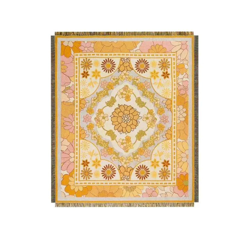 A soft vintage-inspired decorbites bohemian floral leisure blanket with vibrant yellow pink and cream floral patterns and intricate borders