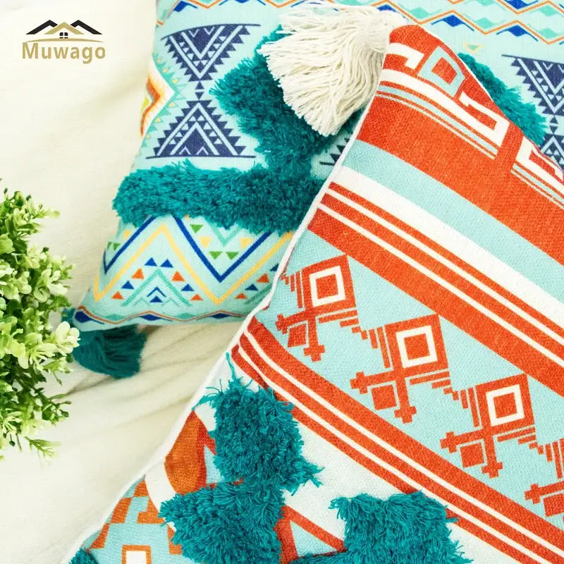 Vibrant turquoise and orange bohemian floral throw pillow cover with fluffy tassels for living room decorbites bohemian floral decor
