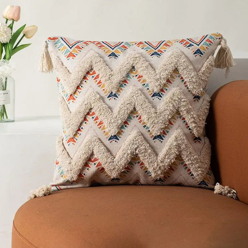 Beige woven bohemian floral throw pillow cover with colorful geometric patterns and zigzag textured fringe for living room decorbites bohemian floral