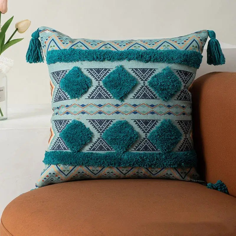 Teal and beige geometric-patterned bohemian floral throw pillow cover with fluffy tassels for living room decorbites bohemian floral