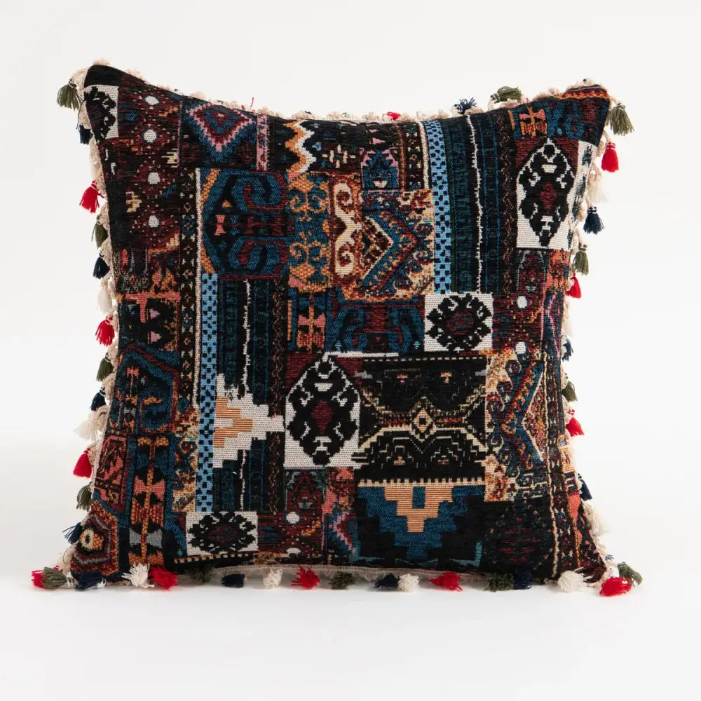 Bohemian flower cushion cover with intricate geometric tribal patterns in deep blues black reds and colorful tassels decorbites bohemian flower cushion