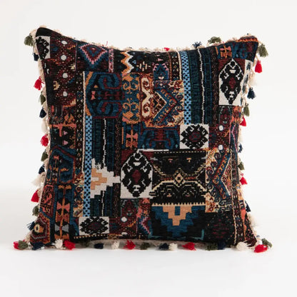 Bohemian flower cushion cover with intricate geometric tribal patterns in deep blues black reds and colorful tassels decorbites bohemian flower cushion