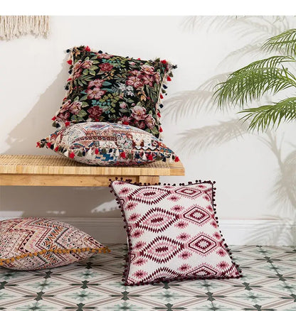 Bohemian flower cushion cover with white base maroon geometric patterns and black pom-poms by decorbites for living room decor