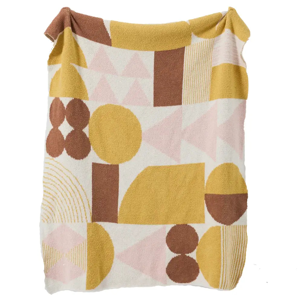 Cozy throw blanket with bohemian flower knitted geometric pattern in mustard, terracotta, and pink on cream decorbites decor