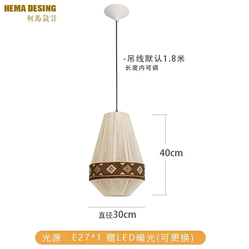 Cream-colored woven bohemian fringe pendant lamp with brown geometric band and adjustable black cord for dining room lighting